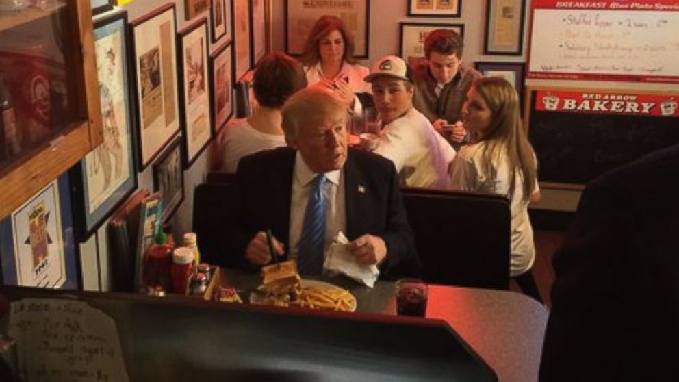 In his first real NH retail stop, Donald Trump ordered a burger at the famous Red Arrow Diner. 