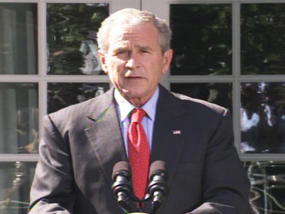 pic of george bush after passage of the house bailout bill