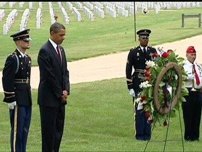 ABC News video of Marines presenting President Obama with a wreath.