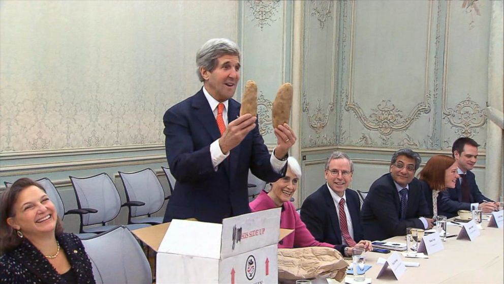 PHOTO: John Kerry gives potatoes to his Russian counterpart, Jan. 2014.
