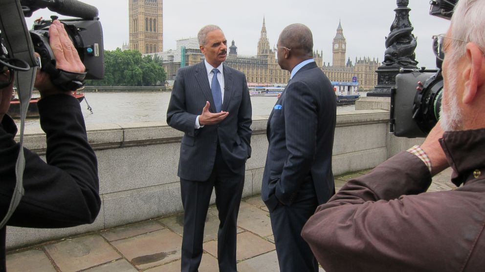 Pierre Thomas speaks with Attorney General Eric Holder in London on Friday, July 11th, 2014.
