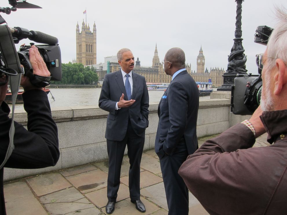 PHOTO: Pierre Thomas speaks with Attorney General Eric Holder in London on Friday, July 11th, 2014.