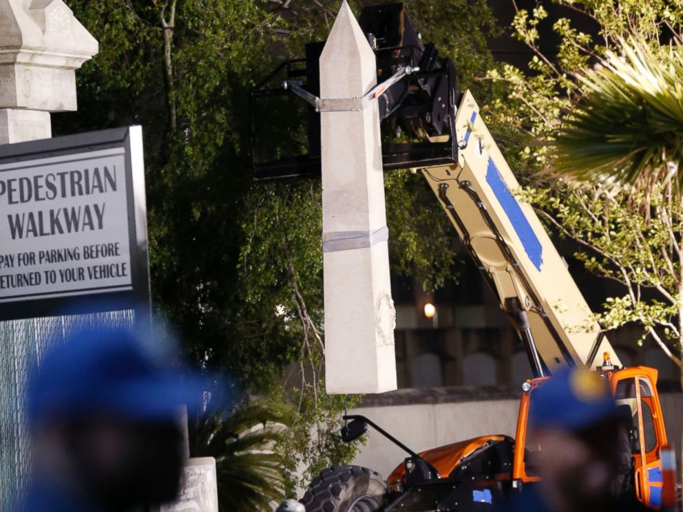 PHOTO: Workers dismantle the Liberty Place monument which commemorates whites who tried to topple a biracial post-Civil War government, April 24, 2017, in New Orleans.
