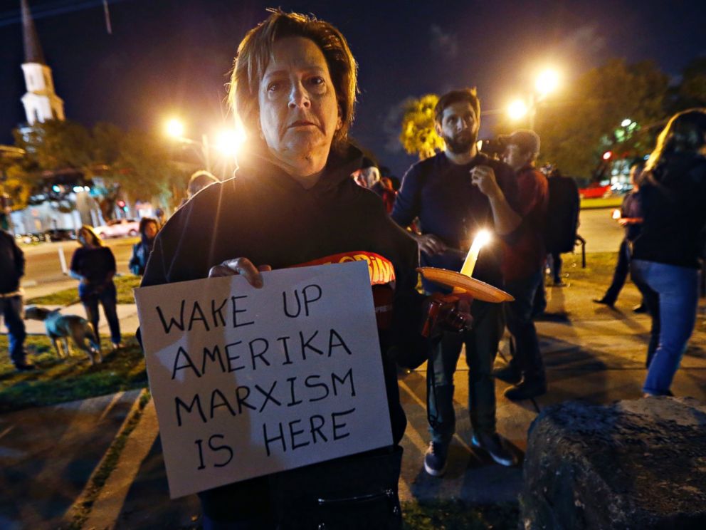 PHOTO: Dana Farley, of New Orleans, participates in a candlelight vigil at the statue of Jefferson Davis, April 24, 2017, in New Orleans before the statues removal.