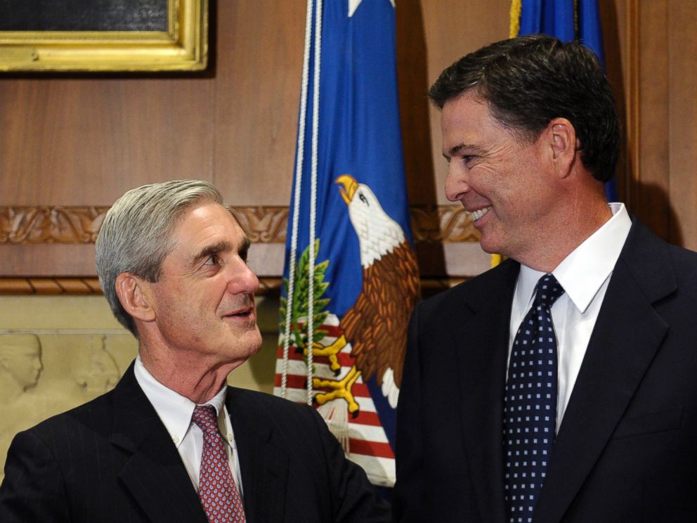 PHOTO: A Sept.4, 2013 file photo showing incoming FBI Director James Comey, right, talking with retiring FBI Director Robert Mueller at the Justice Department in Washington,D.C.