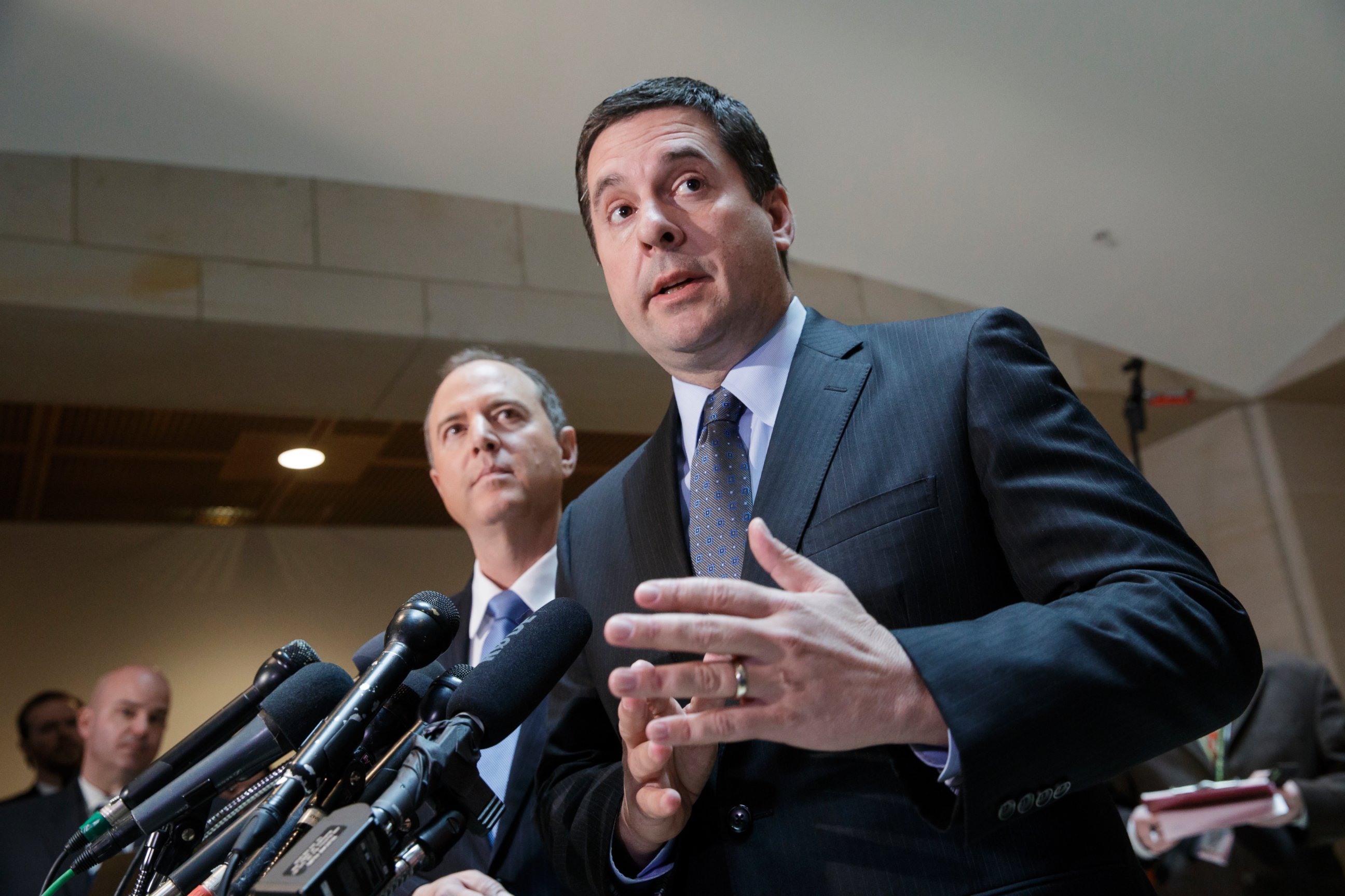 PHOTO: House Intelligence Committee Chairman Rep. Devin Nunes, R-Calif., right, accompanied by the committee's ranking member, Rep. Adam Schiff, D-Calif., talk to reporters, on Capitol Hill in Washington, March, 15, 2017.