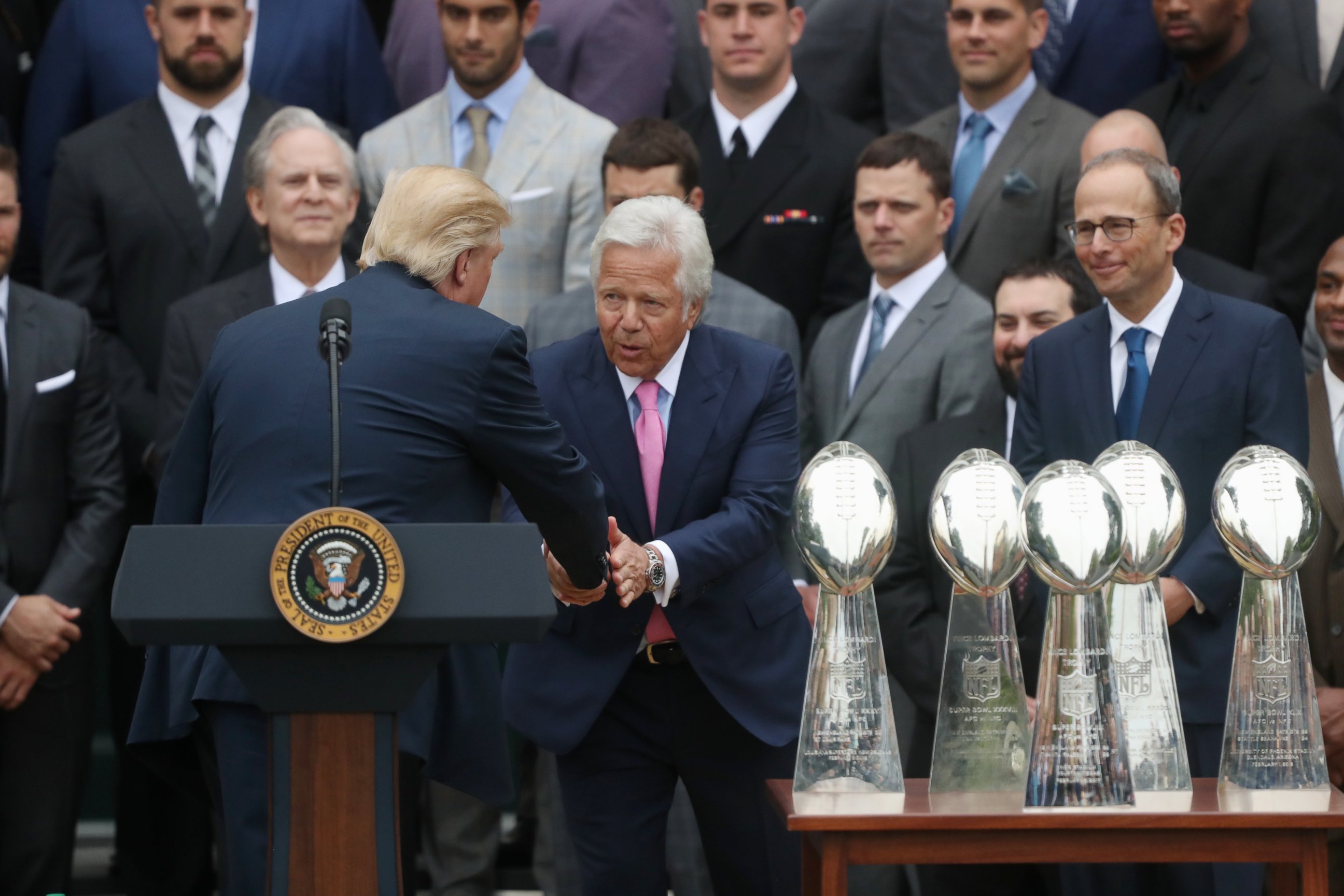 PHOTO: President Donald Trump shakes hands with New England Patriots owner Robert Kraft during a ceremony on the South Lawn of the White House which honored the Super Bowl Champion New England Patriots, April 19, 2017.