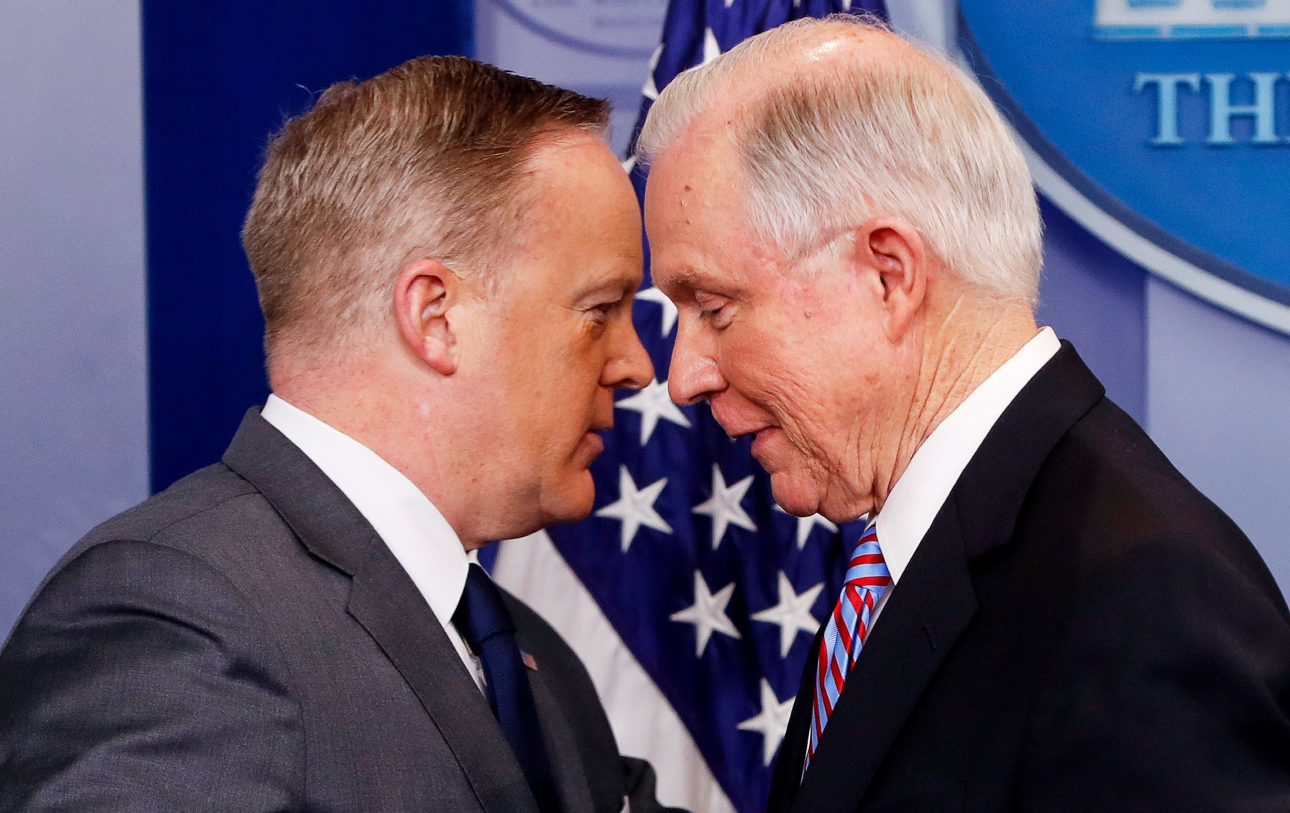 PHOTO: White House press secretary Sean Spicer allows Attorney General Jeff Sessions to pass him after Sessions addressed members of the media during the daily briefing in the Brady Press Briefing Room of the White House in Washington, March 27, 2017. 