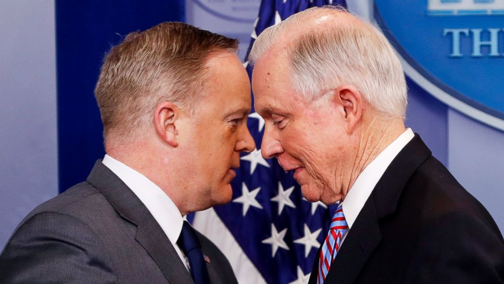PHOTO: White House press secretary Sean Spicer allows Attorney General Jeff Sessions to pass him after Sessions addressed members of the media during the daily briefing in the Brady Press Briefing Room of the White House in Washington, March 27, 2017. 