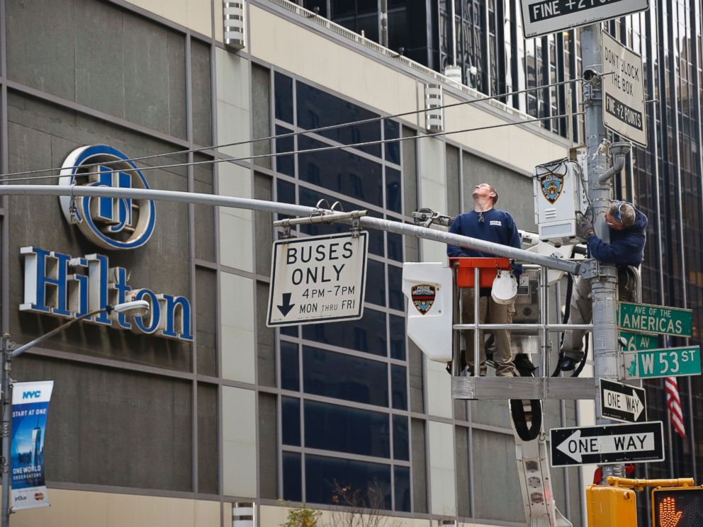 PHOTO: NYPD install a police security camera near the Hilton hotel in New York, Nov. 4, 2016, where Donald Trump organizers will gather on election night.