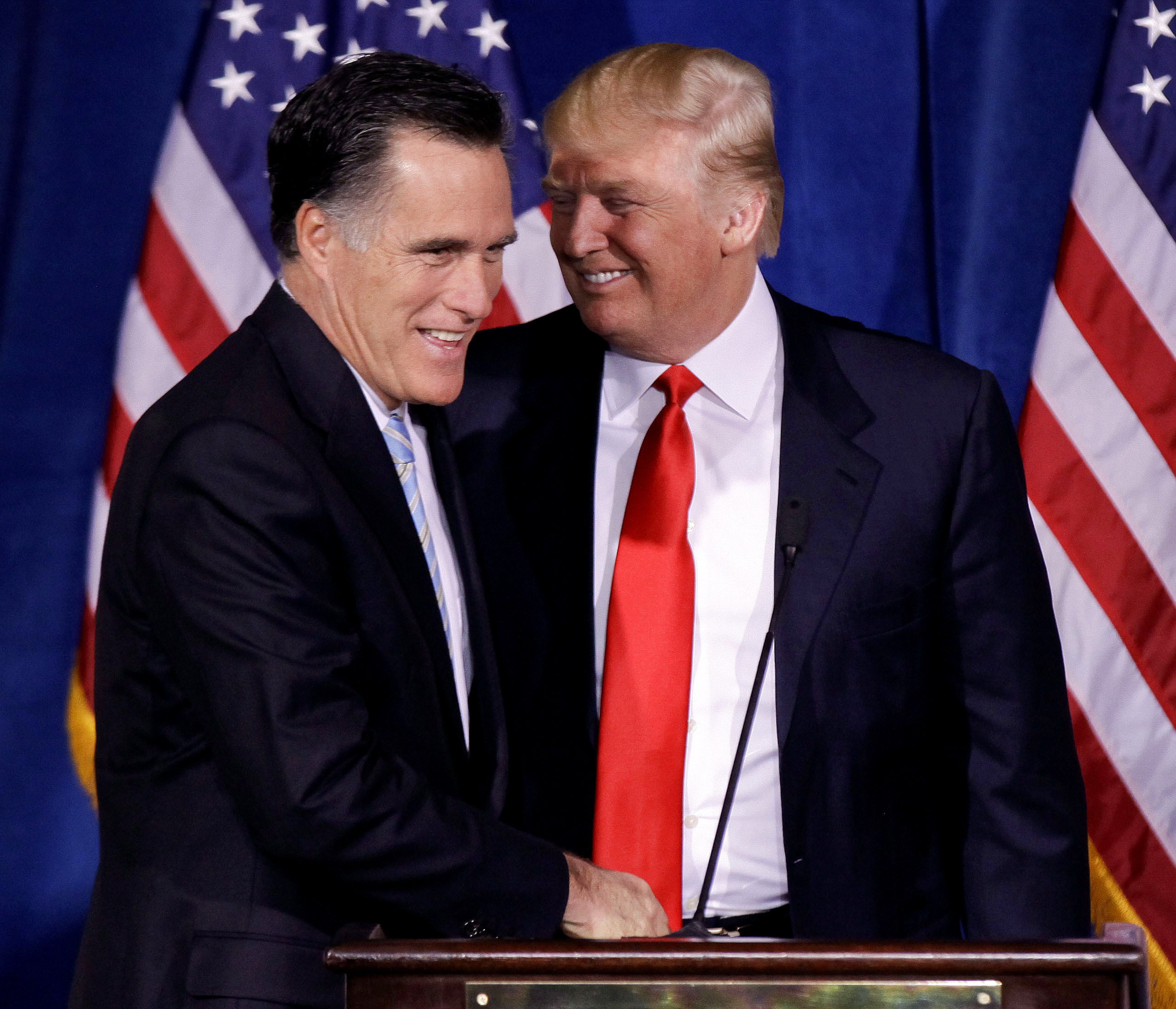 PHOTO: Donald Trump greets Republican presidential candidate, former Massachusetts Gov. Mitt Romney, after announcing his endorsement of Romney during a news conference, Feb. 2, 2012, in Las Vegas. 
