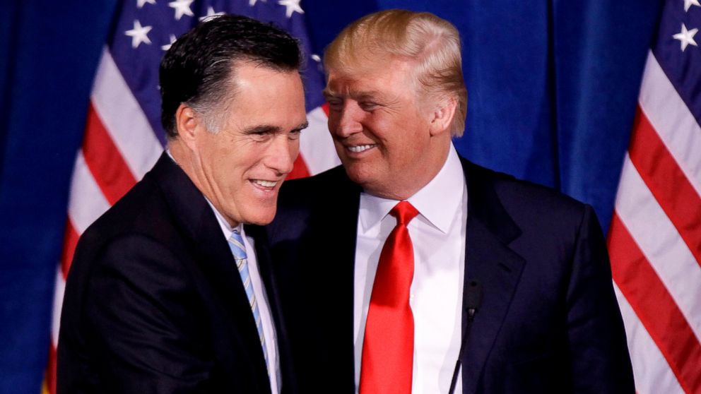 Donald Trump greets Republican presidential candidate, former Massachusetts Gov. Mitt Romney, after announcing his endorsement of Romney during a news conference, Feb. 2, 2012, in Las Vegas.