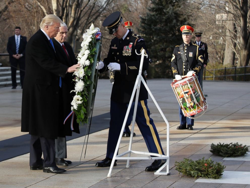 PHOTO: President-elect Donald Trump, accompanied by Vice President-elect Mike Pence places a wreath at the Tomb of the Unknowns, Jan. 19, 2017, at Arlington National Cemetery in Arlington, Va.