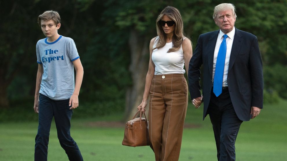 PHOTO: President Donald Trump, first lady Melania Trump, and their son and Barron Trump walk from Marine One across the South Lawn to the White House in Washington, June 11, 2017, as they return from Bedminster, N.J.