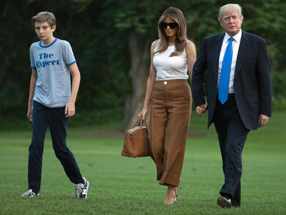 PHOTO: President Donald Trump, first lady Melania Trump, and their son and Barron Trump walk from Marine One across the South Lawn to the White House in Washington, June 11, 2017, as they return from Bedminster, N.J.