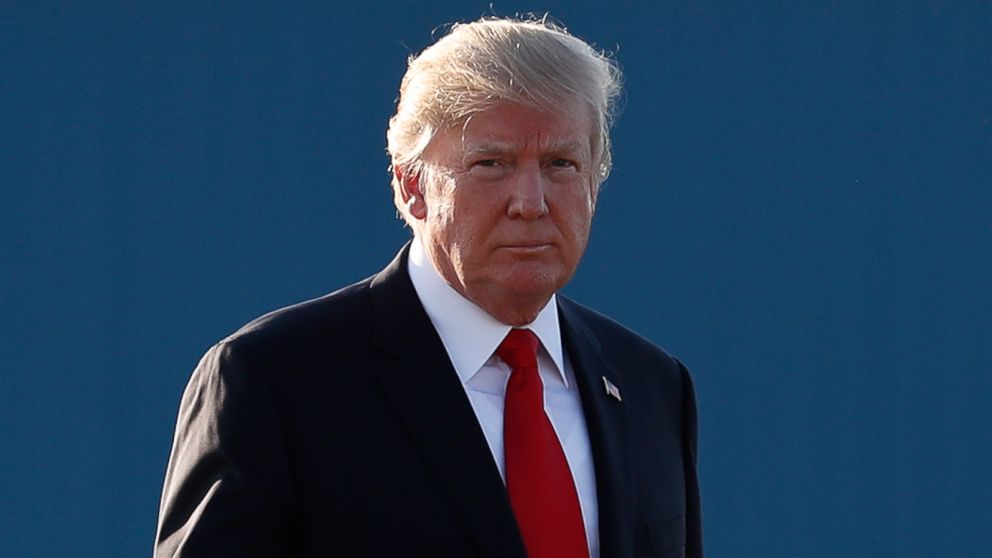 President Donald Trump waves as he walks from Marine One to board Air Force One at Morristown Municipal Airport, in Morristown, N.J., July 3, 2017, en route to Washington from Trump National Golf Club in Bedminster, N.J. 