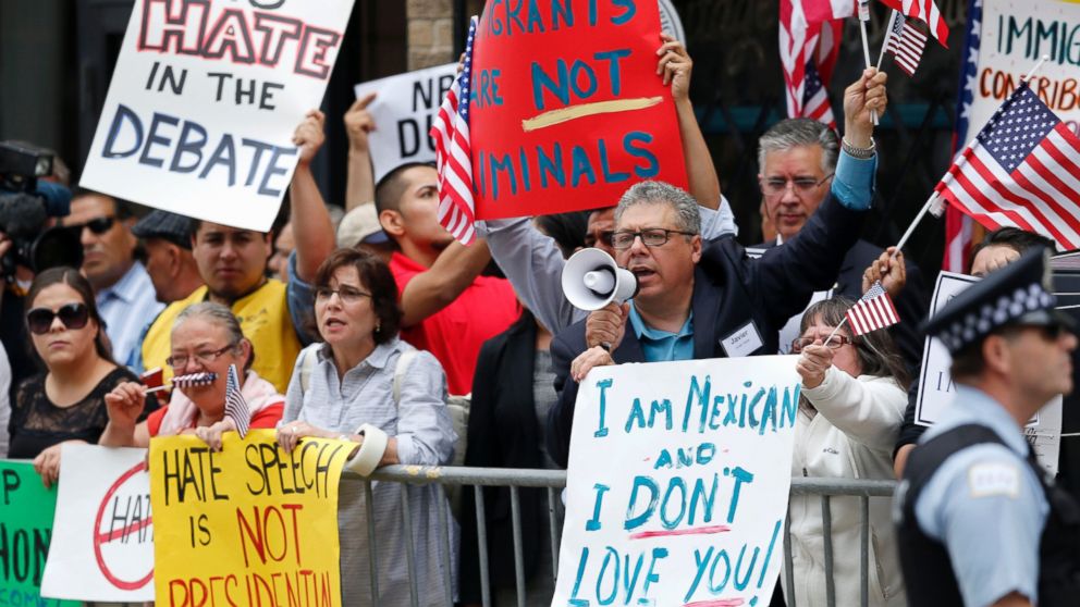 PHOTO: In this June 29, 2015, file photo, protesters gather across the street from a restaurant in Chicago before Republican presidential candidate Donald Trump spoke to members of the City Club of Chicago.