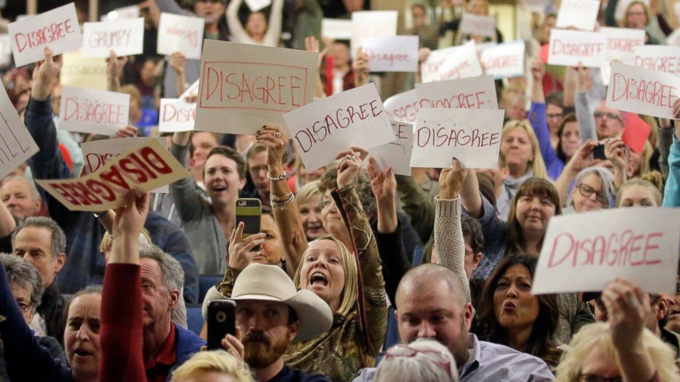 PHOTO: People react to Rep. Jason Chaffetz as he speaks during a town hall meeting at Brighton High School, Feb. 9, 2017, in Cottonwood Heights, Utah. 