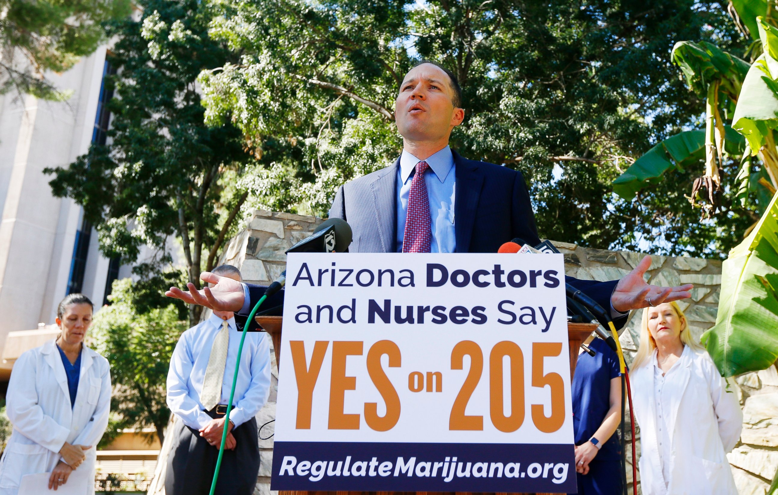 PHOTO: Doctors and nurses in Phoenix, Arizona at an event in front of the state capitol for Prop 205, the legalization of recreational marijuana, Oct. 26, 2016.