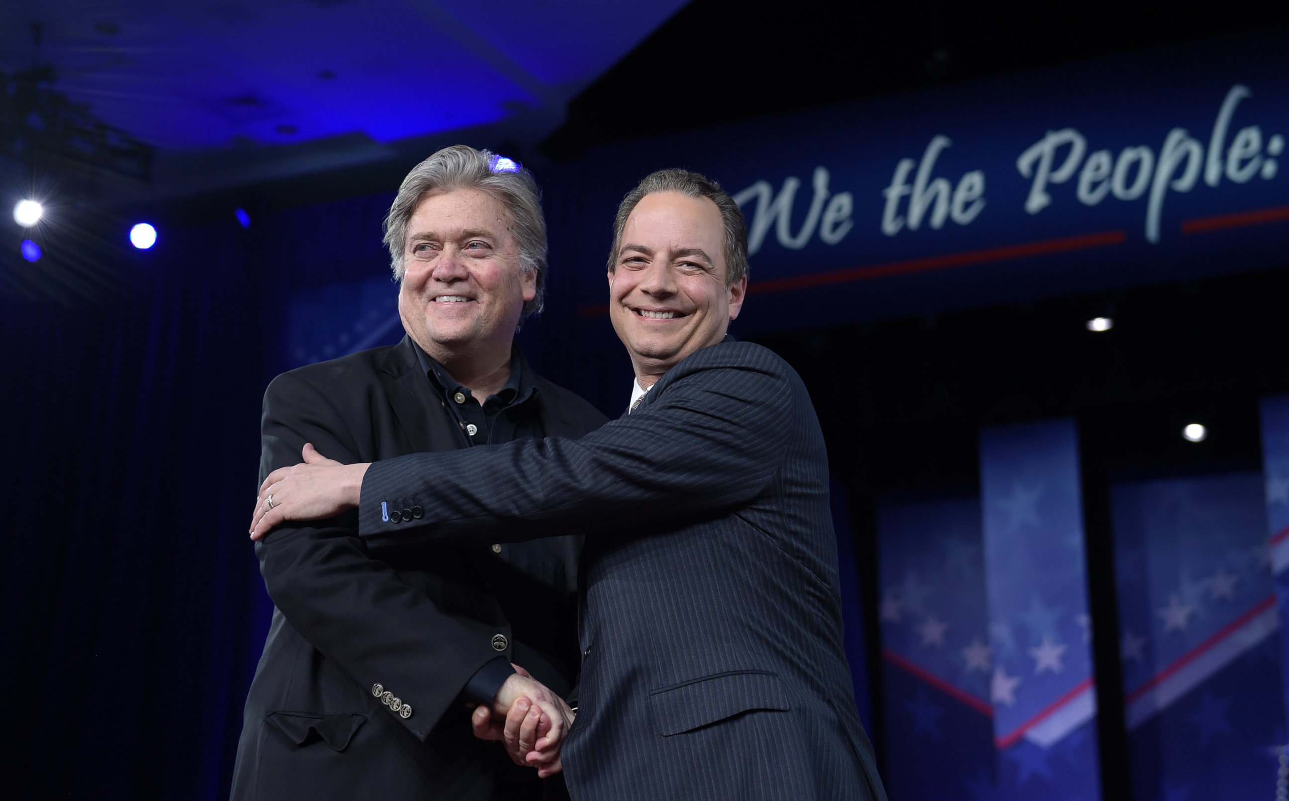 PHOTO: White House Chief of Staff Reince Priebus, right, hugs White House strategist Stephen Bannon as they are introduced to speak at the Conservative Political Action Conference (CPAC) in Oxon Hill, Maryland, Feb. 23, 2017. 