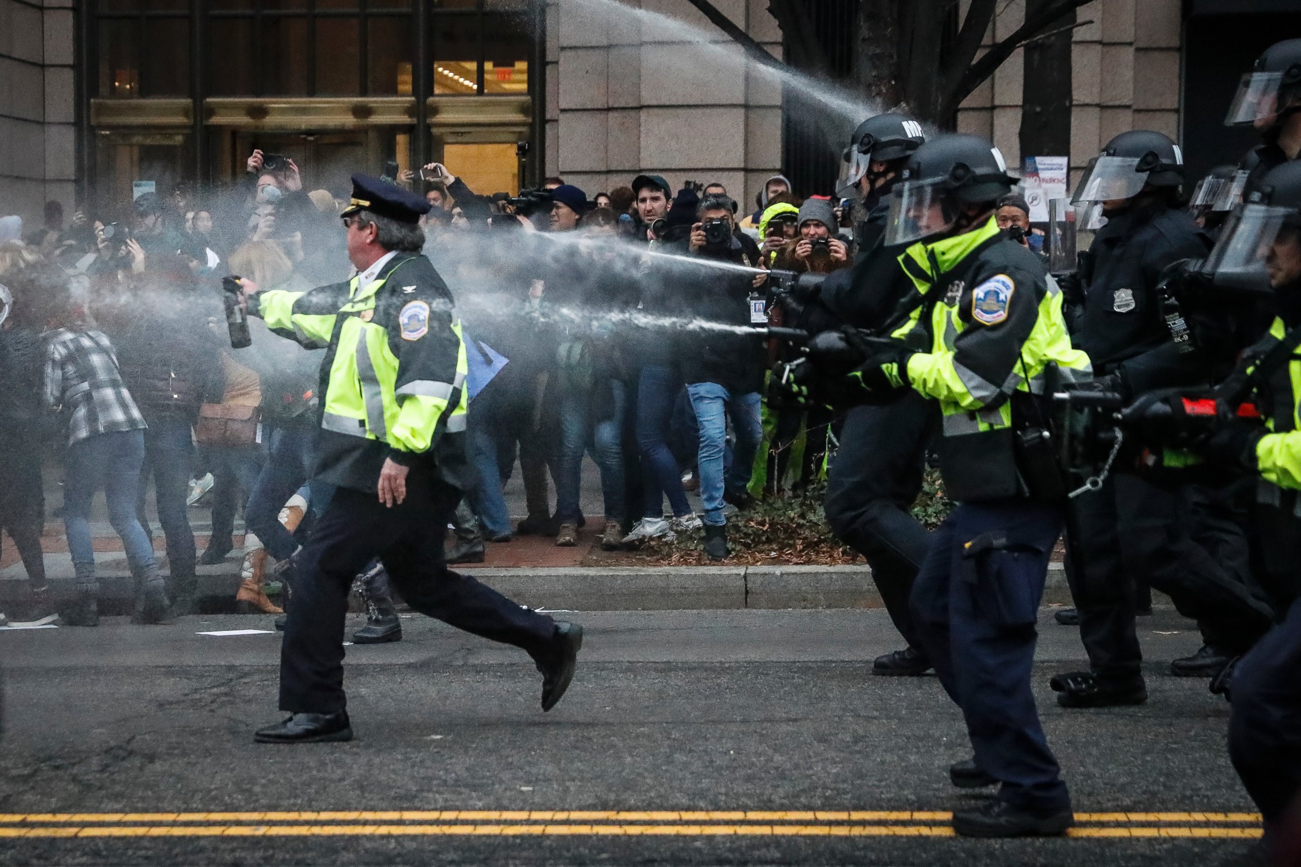 PHOTO: Police fire pepper spray on protesters during a demonstration after the inauguration of President Donald Trump, Jan. 20, 2017, in Washington.