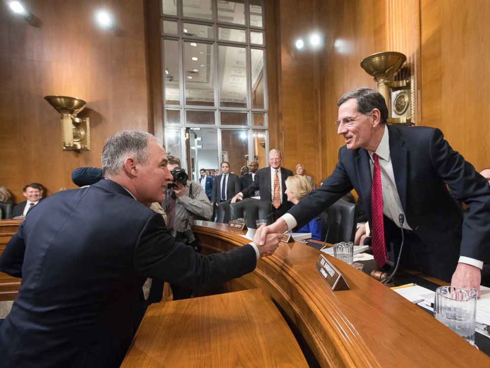 PHOTO: Environmental Protection Agency Administrator-designate Scott Pruitt, left, is welcomed on Capitol Hill in Washington, Jan. 18, 2017, by Sen. John Barrasso.