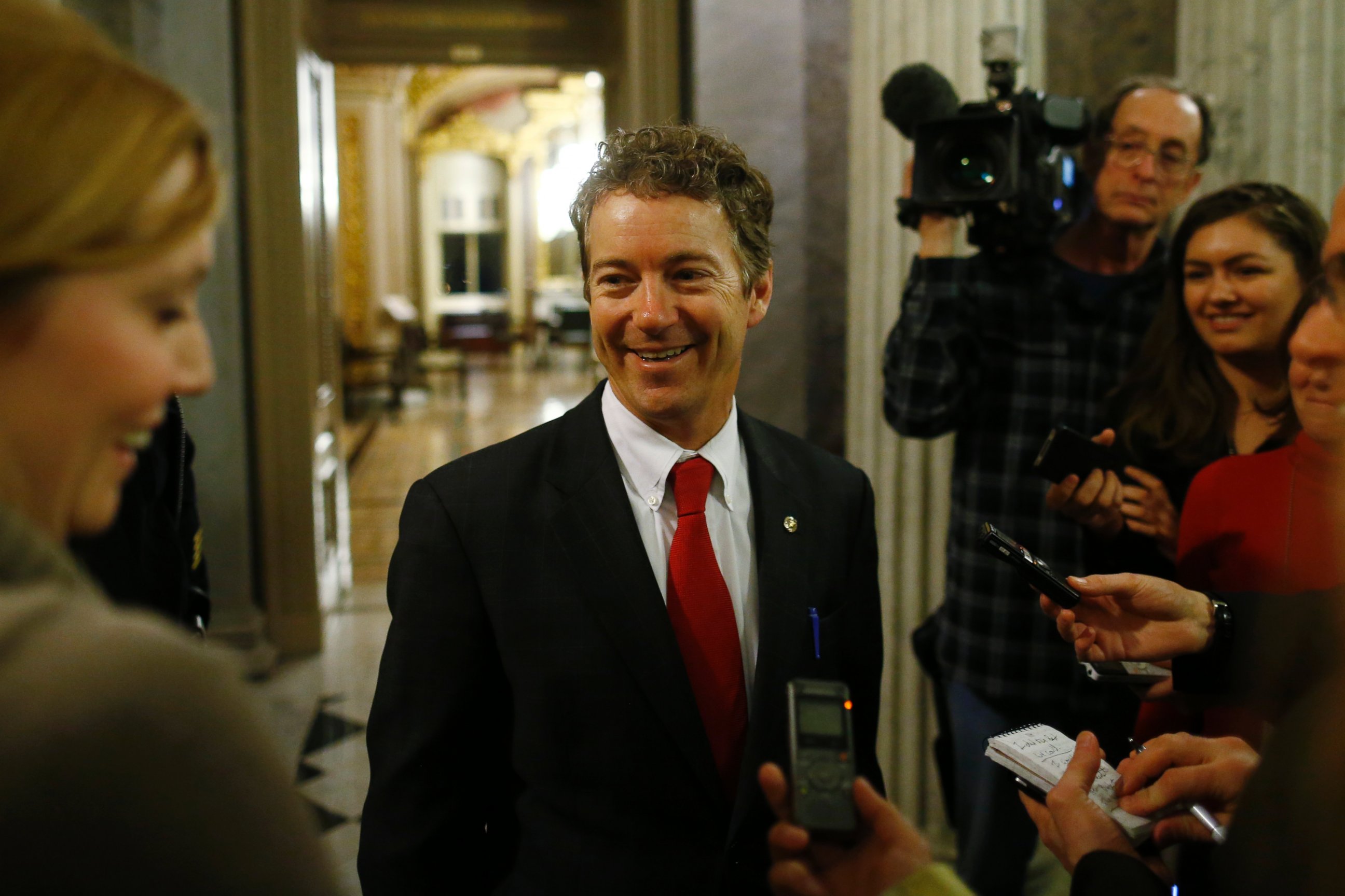 PHOTO: Sen. Rand Paul, leaves the floor of the Senate after his filibuster of the nomination of John Brennan to be CIA director on Capitol Hill in Washington, March 7, 2013.