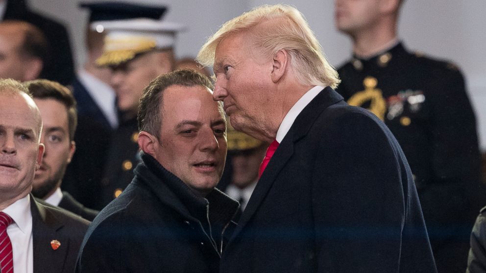President Donald Trump speaks with his Chief of Staff Reince Priebus in the reviewing stand during Trump's inaugural parade on Pennsylvania Ave. outside the White House in Washington, Jan. 20, 2017.