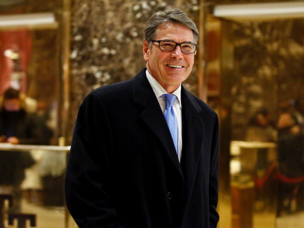 PHOTO: Rick Perry smiles as he leaves Trump Tower, Dec. 12, 2016, in New York.