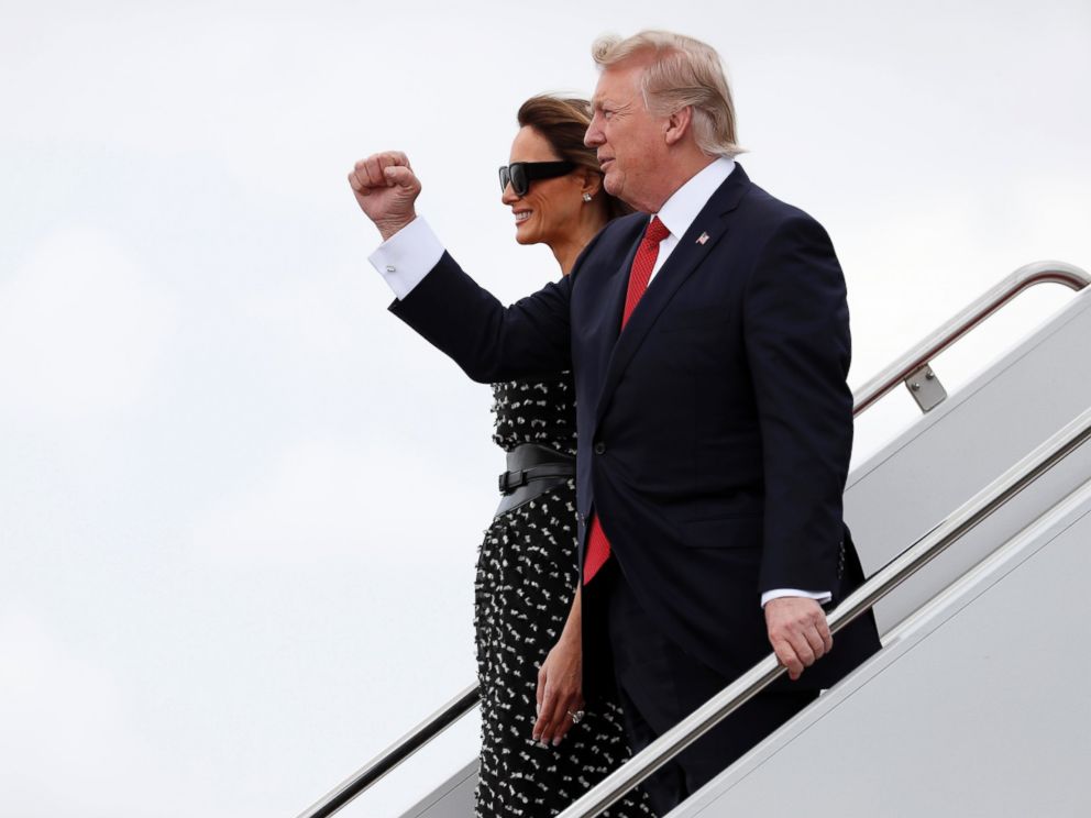 PHOTO: President Donald Trump and first lady Melania Trump walk down the stairs of Air Force One as they arrive at the Palm Beach International Airport, April 6, 2017, in West Palm Beach, Fla., en route to Mar-a-Largo.