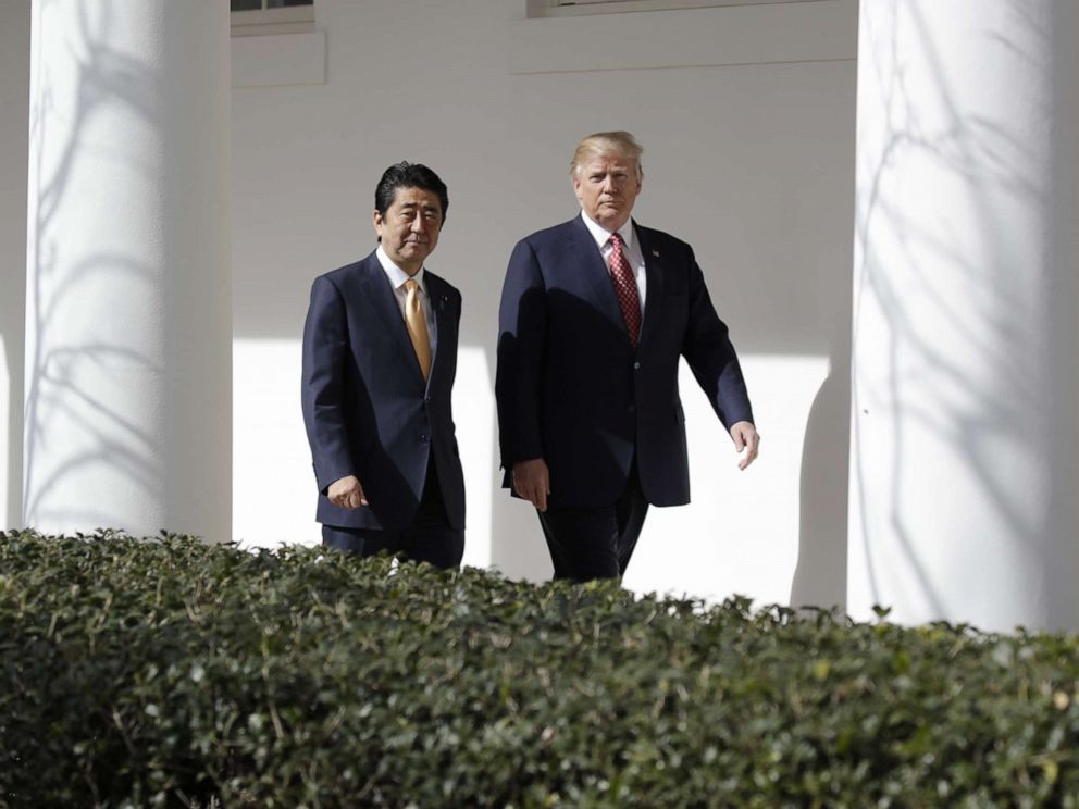 PHOTO: Donald Trump walks with Japanese Prime Minister Shinzo Abe at the White House in Washington, Feb. 10, 2017.