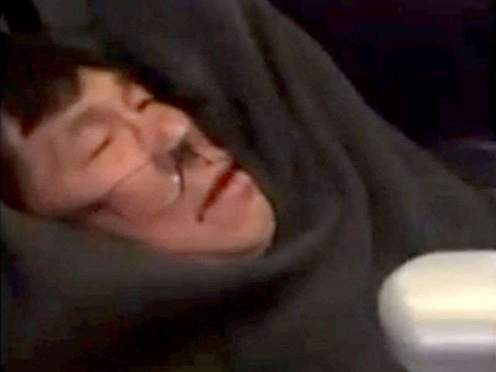 PHOTO: A video screengrab shows passenger David Dao being dragged off a United Airlines flight at Chicago OHare International Airport in this video filmed by @JayseDavid April 9, 2017.