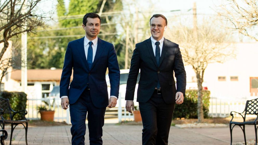 PHOTO: Democratic presidential candidate Pete Buttigieg, left, and his husband Chasten Buttigieg, walk to a meeting with members of the media in Plains, Ga., March 1, 2020.