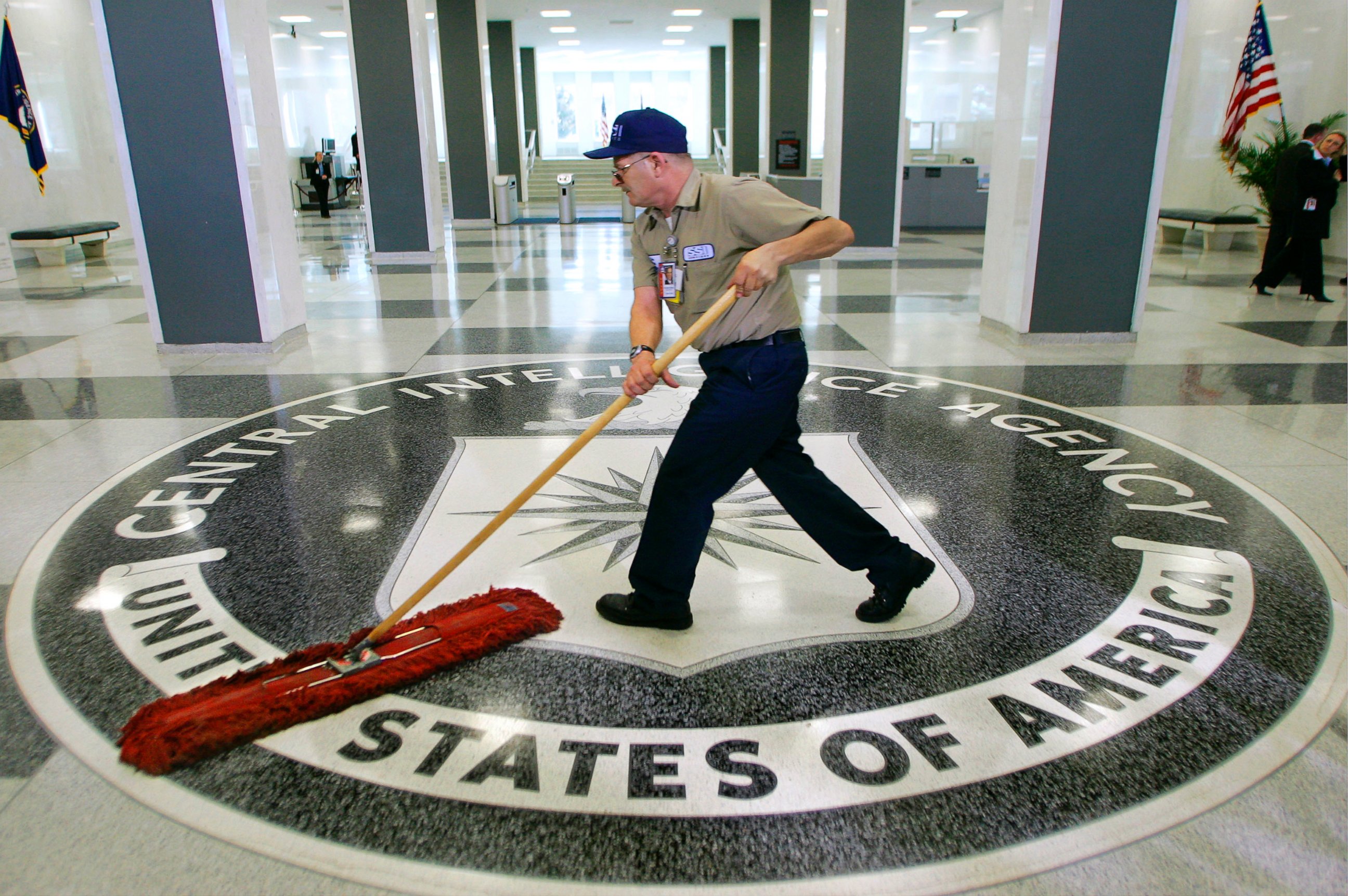 PHOTO: A workman slides a mop over the floor at the Central Intelligence Agency headquarters in Langley, Va, March 3, 2005. 