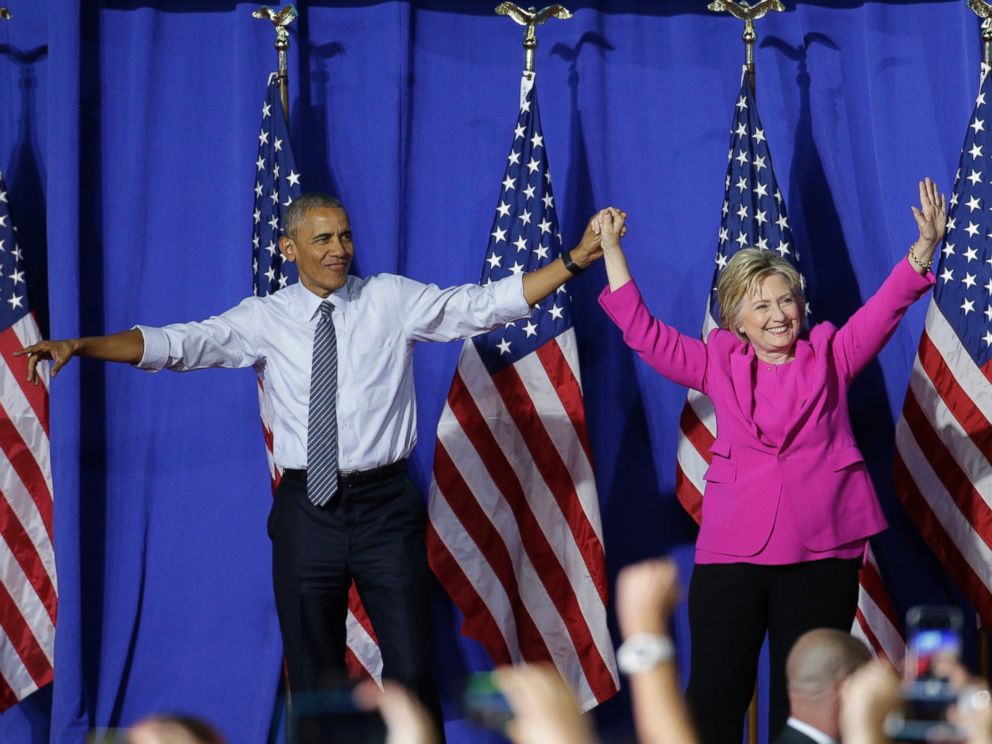 PHOTO: President Barack Obama and Democratic presidential candidate Hillary Clinton wave to the crowd during a campaign rally for Clinton in Charlotte, North Carolina, July 5, 2016.
