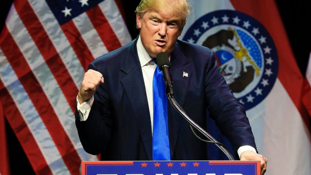 Republican presidential candidate Donald Trump describes how he was ready to punch a person who rushed the stage during an election rally earlier in the day, as he speaks to a crowd in Kansas City, Mo., Saturday, March 12, 2016. (AP Photo/Nati Harnik)