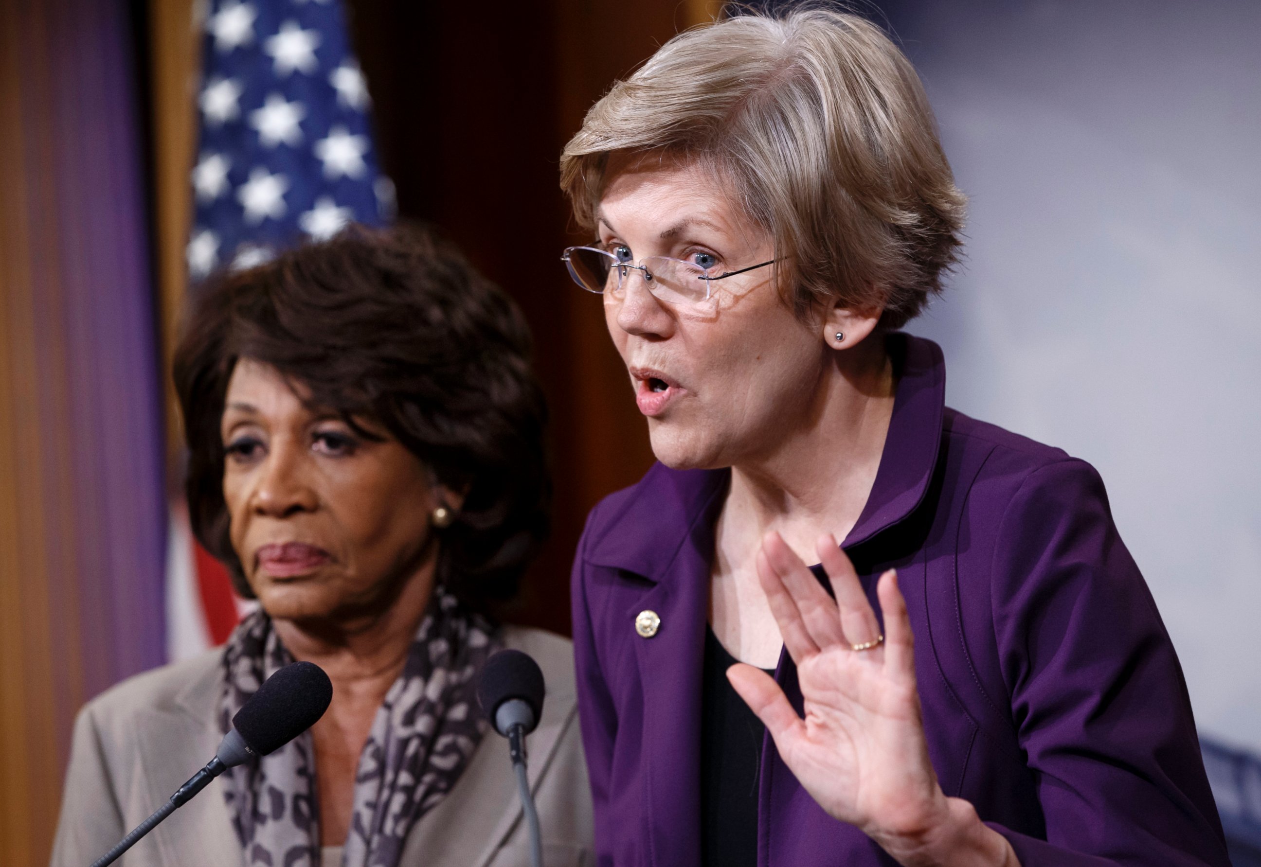 PHOTO: Sen. Elizabeth Warren, D-Mass., and Rep. Maxine Waters, D-Calif., speak on Capitol Hill Wednesday, Dec. 10, 2014.