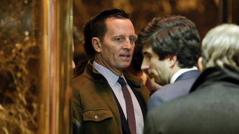 FILE - In this Dec. 12, 2016, file photo, Richard Grenell, left, arrives at Trump Tower in New York. Grenell, who served as the spokesman for the U.S. at the United Nations under former President George W. Bush, is considered a top choice to be nominated as the United States' ambassador to Germany.