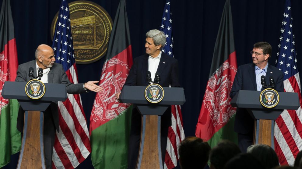 PHOTO: Afghanistan's President Ashraf Ghani, accompanied by Secretary of State John Kerry and Defense Secretary Ash Carter, speaks during a news conference at the Camp David Presidential retreat, Monday, March 23, 2015.