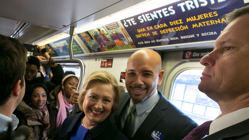 PHOTO: Democratic presidential candidate Hillary Clinton and Bronx Borough President Ruben Diaz Jr. ride the subway in the Bronx borough of New York, April 7, 2016.