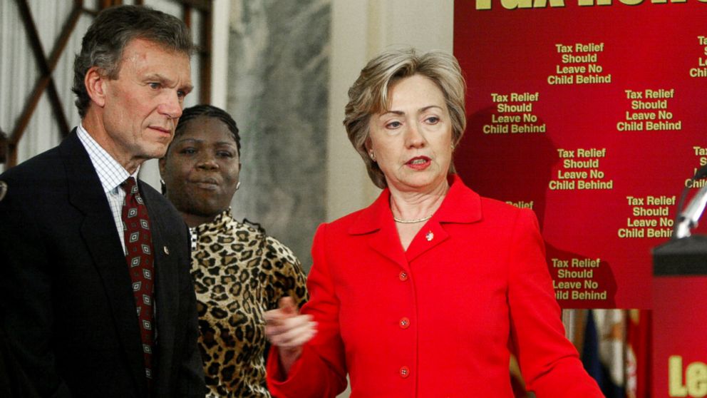 Hillary Clinton and Tom Daschl, prepare to speak, June 5, 2003, at a news conference. 