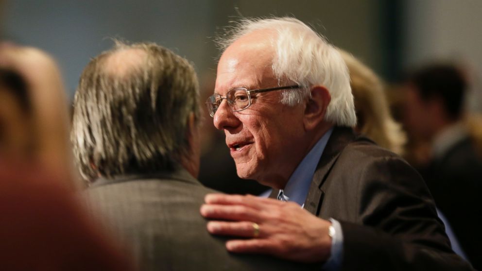 PHOTO: Democratic presidential candidate Sen. Bernie Sanders, I-Vt., talks with a supporter during the Iowa Democratic Party's Hall of Fame Dinner, Friday, July 17, 2015, in Cedar Rapids, Iowa.