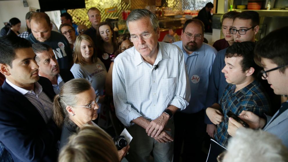 PHOTO: Republican presidential candidate former Florida Gov. Jeb Bush talks with audience members following a meet and greet with local residents at Gravy's Diner, Sept. 22, 2015, in Cedar Falls, Iowa. 