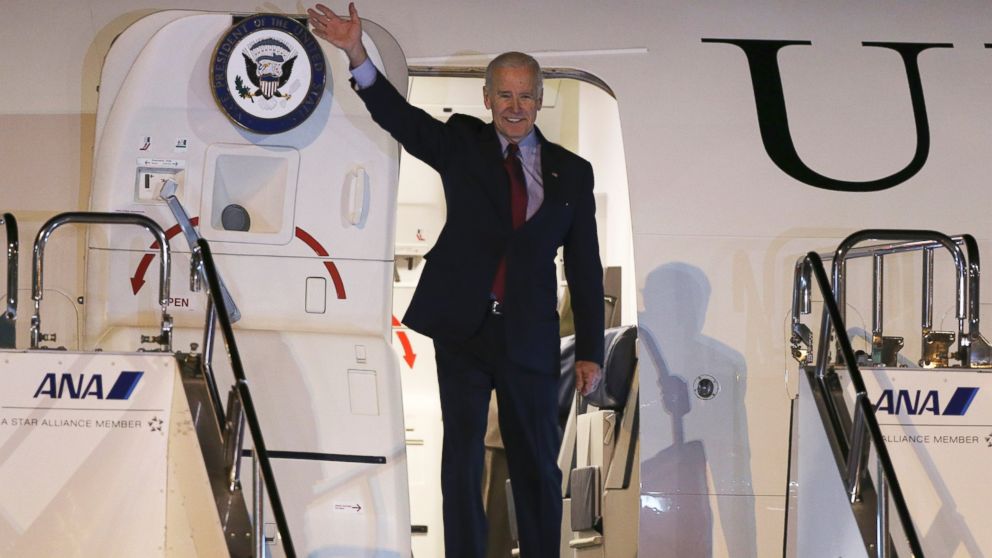 PHOTO: U.S. Vice President Joe Biden waves upon arriving at Tokyo International Airport, Dec. 2, 2013.