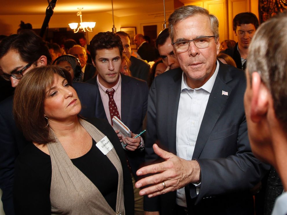 Former Florida Gov. Jeb Bush speaks with area residents at a packed house party Friday, March 13, 2015, in Dover, N.H.