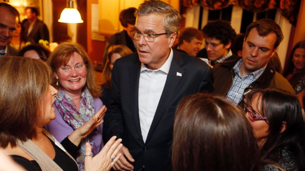 Florida Gov. Jeb Bush speaks with area residents at a packed house party Friday, March 13, 2015, in Dover, N.H. On his opening foray into New Hampshire for his likely campaign for the Republican presidential nomination, Bush challenged voters here to spend time learning about the issues and avoid shrill partisan sniping.