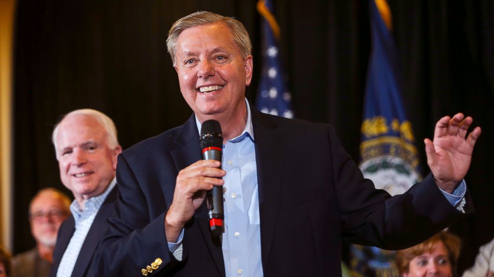 Republican presidential candidate Sen. Lindsey Graham (R-S.C.), right, campaigns with Sen. John McCain, R- Ariz, left, holding a Town Hall Meeting in Manchester, N.H., Saturday, Aug. 1, 2015.