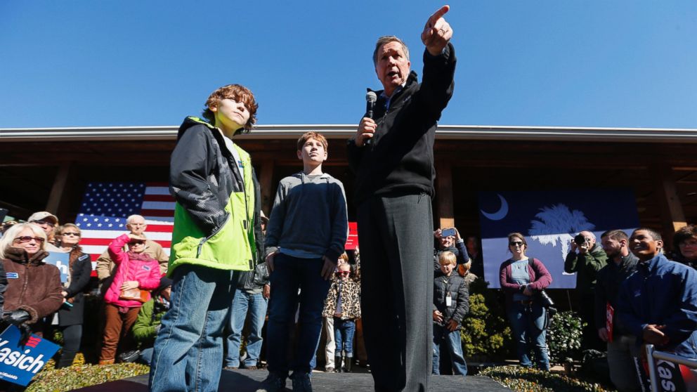 John Kasich speaks with children during a campaign stop, Feb. 13, 2016, in Mauldin, S.C.  