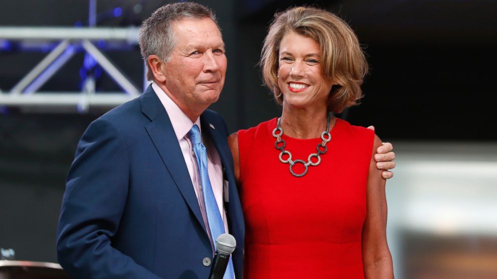 Ohio Gov. John Kasich arrives with his wife Karen at the The Rock and Roll Hall of Fame and Museum on July 19, 2016, in Cleveland, during the second day of the Republican convention.