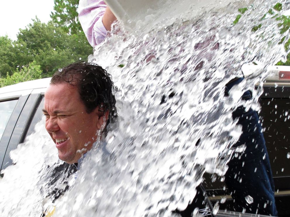 PHOTO: U.S. Rep. Vance McAllister is doused as he takes the strikeout ALS ice bucket challenge after qualifying for his re-election bid Friday, Aug. 22, 2014, in Baton Rouge, La.